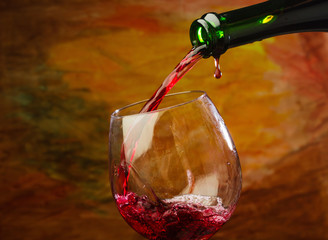 Red wine being poured into wine glass
