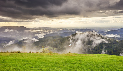 Naklejka na ściany i meble Dramatic sky at rainy day in Black Forest in Germany / Wide panoramic photo of Black Forest nearby Freudenstadt