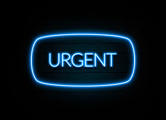 Urgent  - colorful Neon Sign on brickwall