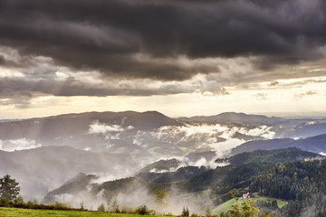 Dramatic sky at rainy day in Black Forest in Germany / Wide panoramic photo of Black Forest nearby Freudenstadt