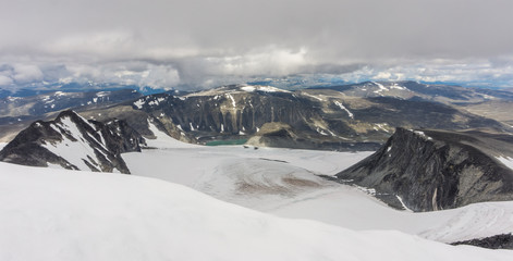 Fototapeta na wymiar View from Mount Glitterthind to Grasubreen Glacier, Jotunheimen National Park, Norway