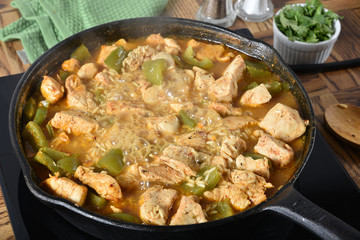 Simmering Cajun chicken and rice