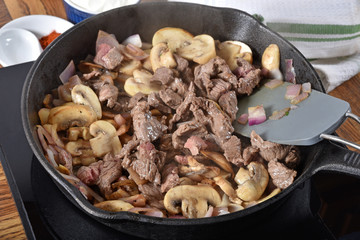 Steak, mushrooms and onions
