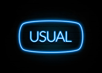 Usual  - colorful Neon Sign on brickwall