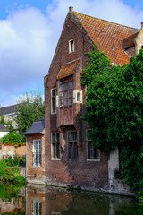 Fototapeta na wymiar belgium city street historical architecture old sky church channel bruges