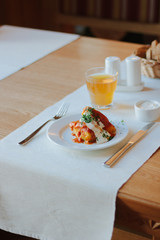 Delicious cabbage rolls on white plate in restaurant.