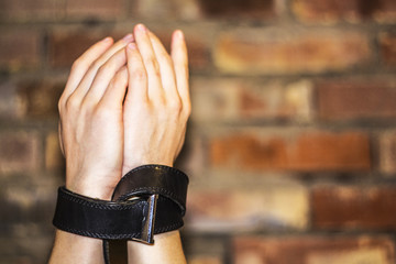 International Day for the Elimination of Violence against Women. Hands of a young white female...