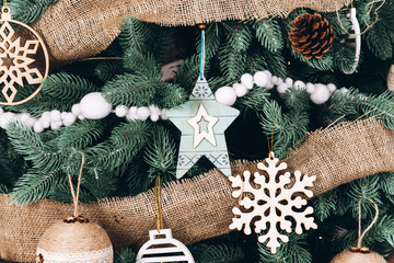 Decorations on a Christmas tree in New Year interior. Christmas and New Year concept