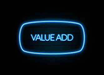 Value Add  - colorful Neon Sign on brickwall