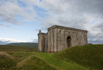 Fototapeta na wymiar The Hermitage Castle in the Border Region of Scotland, United Kingdom; Concept for visit castles in Scotland