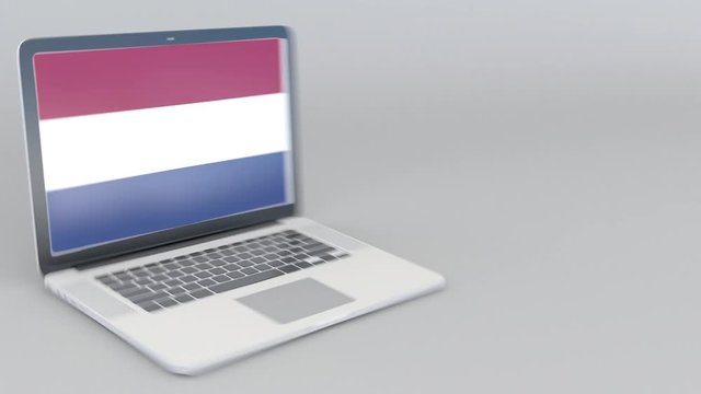 Opening and closing laptop with flag of the Netherlands on the screen. Tourist service, travel planning or cultural study concepts