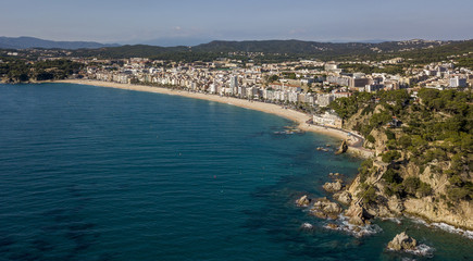Fototapeta na wymiar Aerial view of Lloret de Mar coastal town in Catalonia