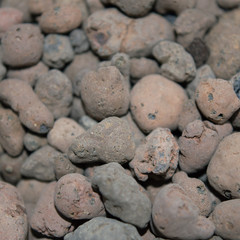 Expanded clay aggregate texture, light weight clay material for constructional and agricultural purposes