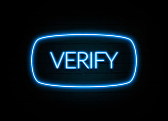 Verify  - colorful Neon Sign on brickwall