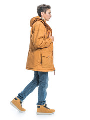 Naklejka premium Teenage boy in winter clothes