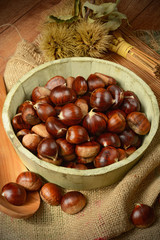 pile of chestnuts in wooden bowl