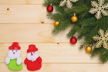 Christmas background. Top view with copy space. fir tree on light wooden background
