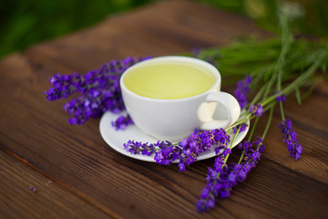 delicious green tea in a beautiful glass bowl on table