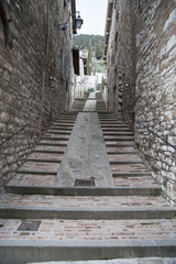 Fototapeta na wymiar Gubbio, Perugia, Italy - small typical street of the Gubbio village.