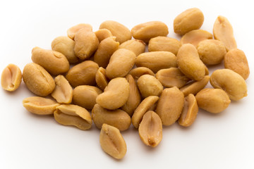 Peeled peanuts on the isolated background.