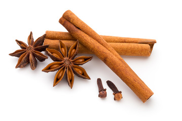 Cloves, anise and cinnamon isolated on white background.