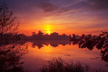 Fototapeta na wymiar Early morning, dawn over the lake. Misty morning, rural landscape, wilderness, mystical feeling