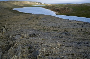 Fototapeta na wymiar Stone cliffs of the Arctic archipelago Novaya Zemlya