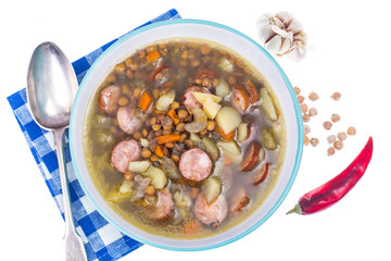 Vegetable soup with chickpeas and smoked sausages