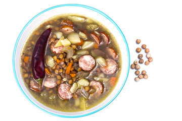 Vegetable soup with chickpeas and smoked sausages