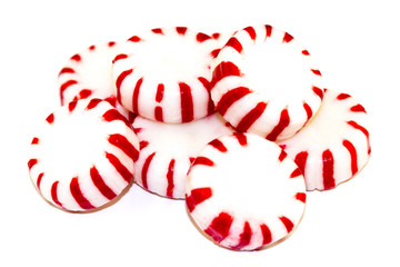 Red peppermint candy on a white background