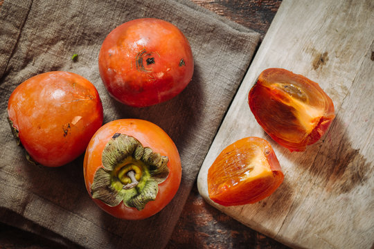 Fresh raw kaki fruits