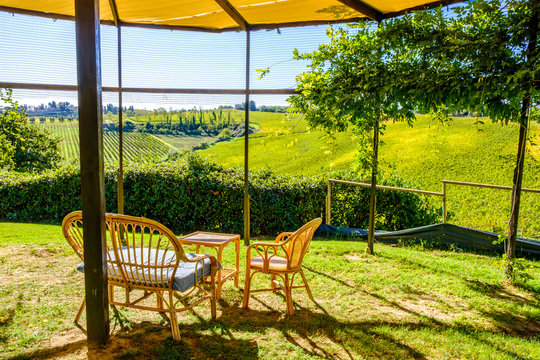 Relaxation sitting area with magnificent view of vineyard in Tuscany, Italy