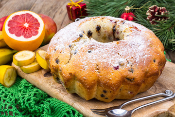 Homemade pastry for Christmas. Holiday cupcakes with fruits and chocolate