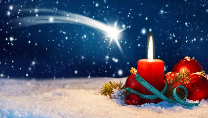 Shooting star Christmas background with candles