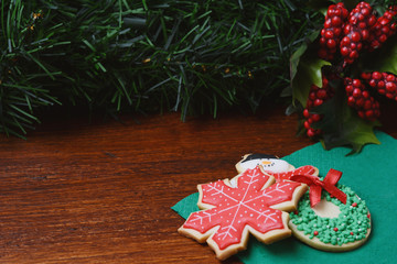 Colorful christmas cookies with festive branches fir