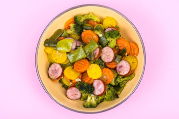 Pieces of chicken in breadcrumbs, fried in frying pan