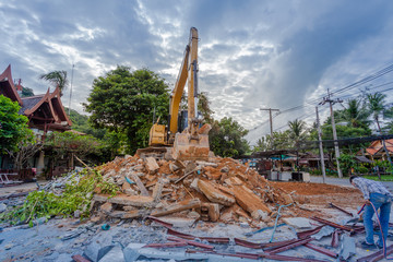 Demolition of buildings Having to use a machine such as the backhoe to demolish can save time and save human labor.
