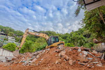 Demolition of buildings Having to use a machine such as the backhoe to demolish can save time and save human labor.
