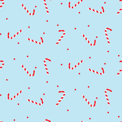CANDY CANE SEAMLESS VECTOR PATTERN. CHRISTMAS BLUE DECORATIVE BACKGROUND