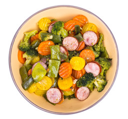 Vegetable stew with pieces of smoked sausage