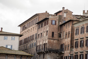 Siena, Italy.. The historic centre of Siena has been declared by UNESCO a World Heritage Site.  Siena is famous for its cuisine, art, museums, medieval cityscape and the Palio, a horse race
