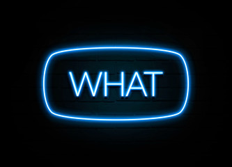 What  - colorful Neon Sign on brickwall