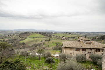 Fototapeta premium San Gimignano is a small walled medieval hill town in Tuscany, Italy. Known as the Town of Fine Towers, San Gimignano is famous for its medieval architecture, unique for its tower houses.