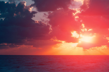 Fototapeta na wymiar Vibrant sunset sky clouds