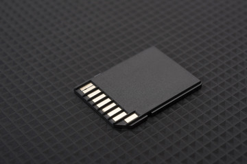 SD Chip Card on Black Background