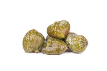 Marinated capers isolated on white background. Canned capers. Macro