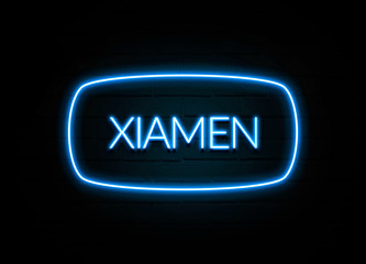 Fototapeta na wymiar Xiamen - colorful Neon Sign on brickwall