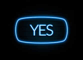 Yes  - colorful Neon Sign on brickwall