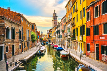Venice rio San Barnaba cityscape, water canal, church and boats. Italy