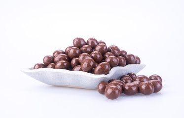 chocolate balls. chocolate balls in bowl on a background